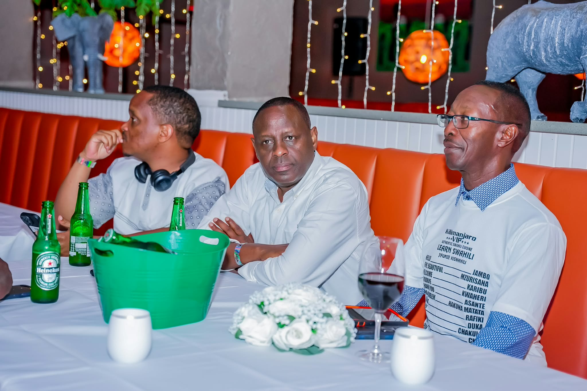 Friends gathered around a table with drinks