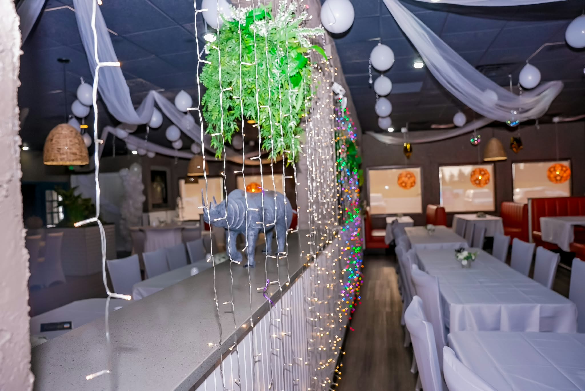 Guests gathered around a table at Kilimanjaro VIP